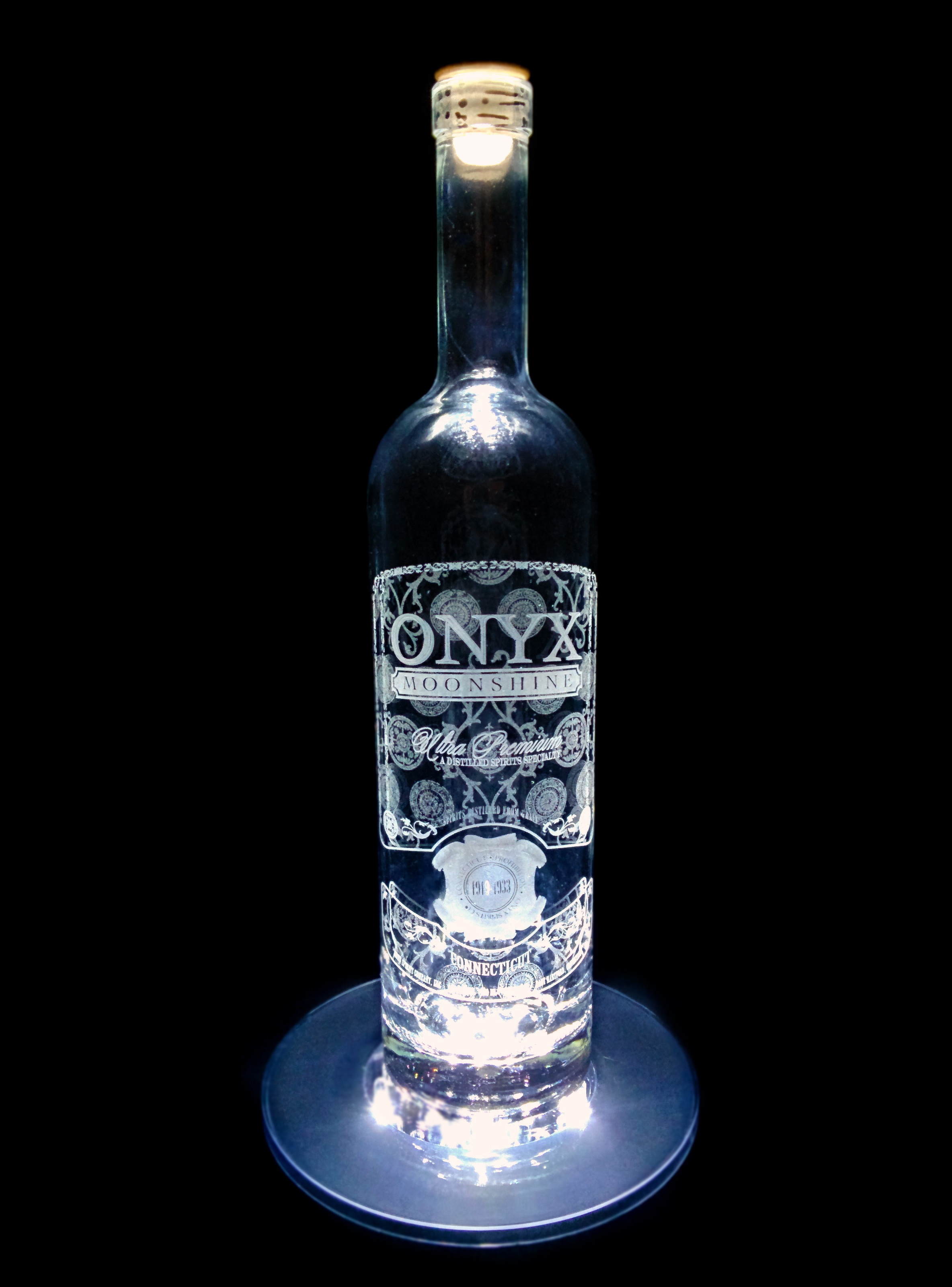 Special Label Laser Engraving on Glass for Onyx Spirits Company, LLC. of East Hartford Connecticut